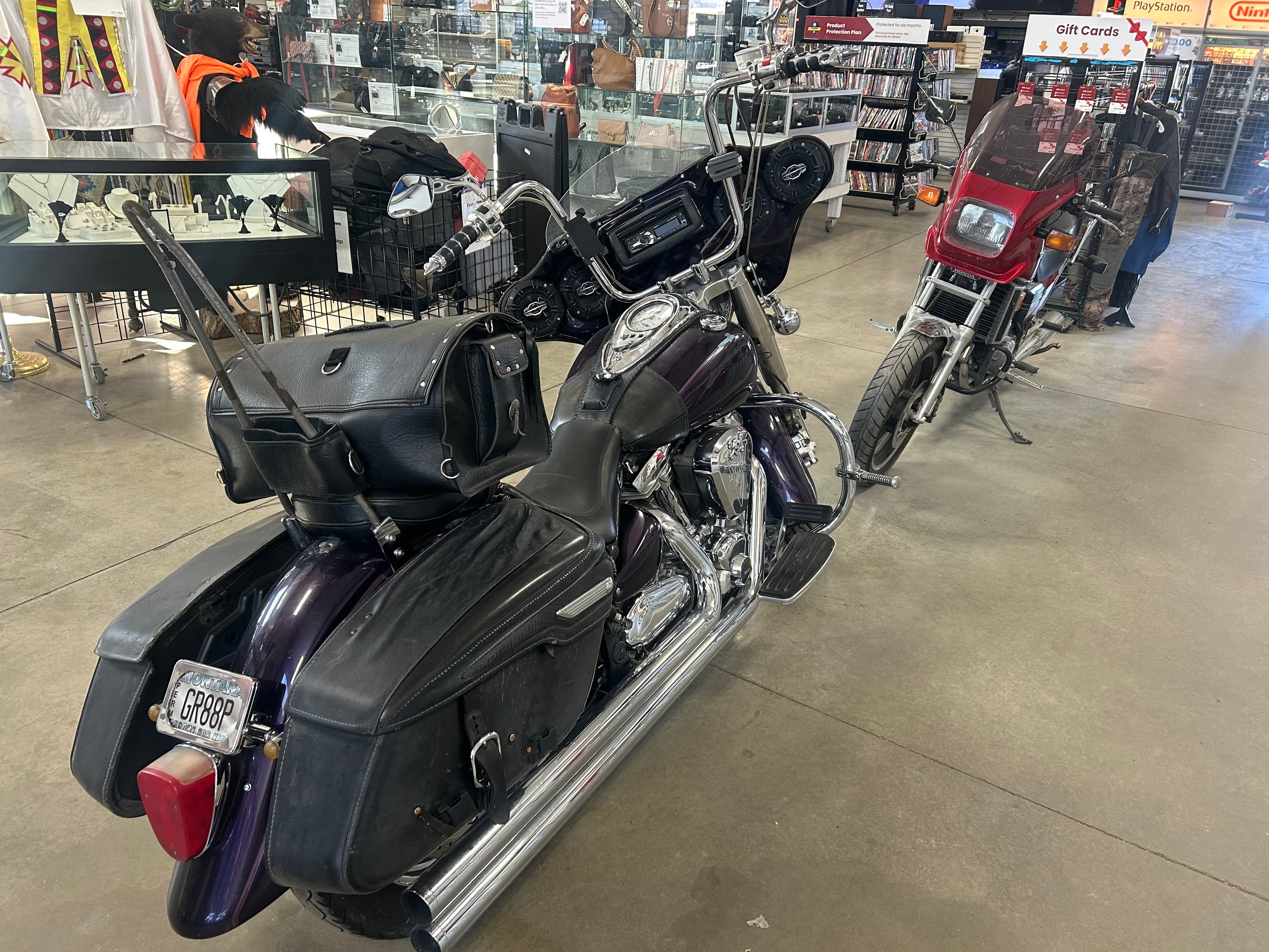 Cash 1 Pawn motorcycles for sale on showroom floor including cruisers and touring bikes - buy motorcycles missoula | Missoula MT