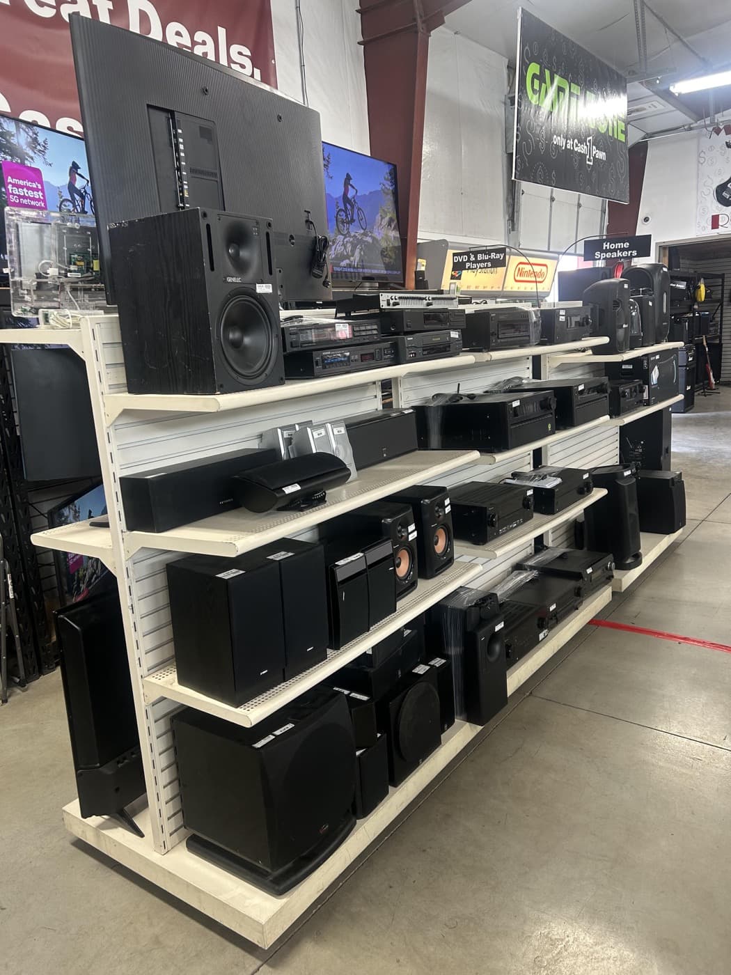 Home audio speakers and receivers on the Cash 1 Pawn sales floor