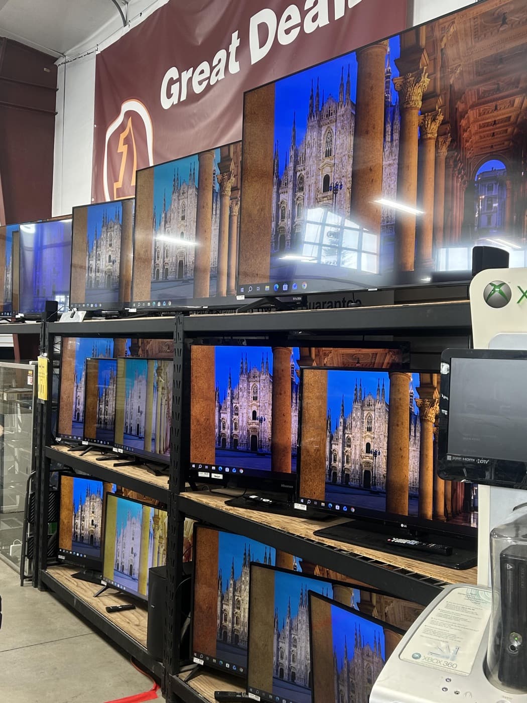 Used televisions displayed in the electronics section at Cash 1 Pawn